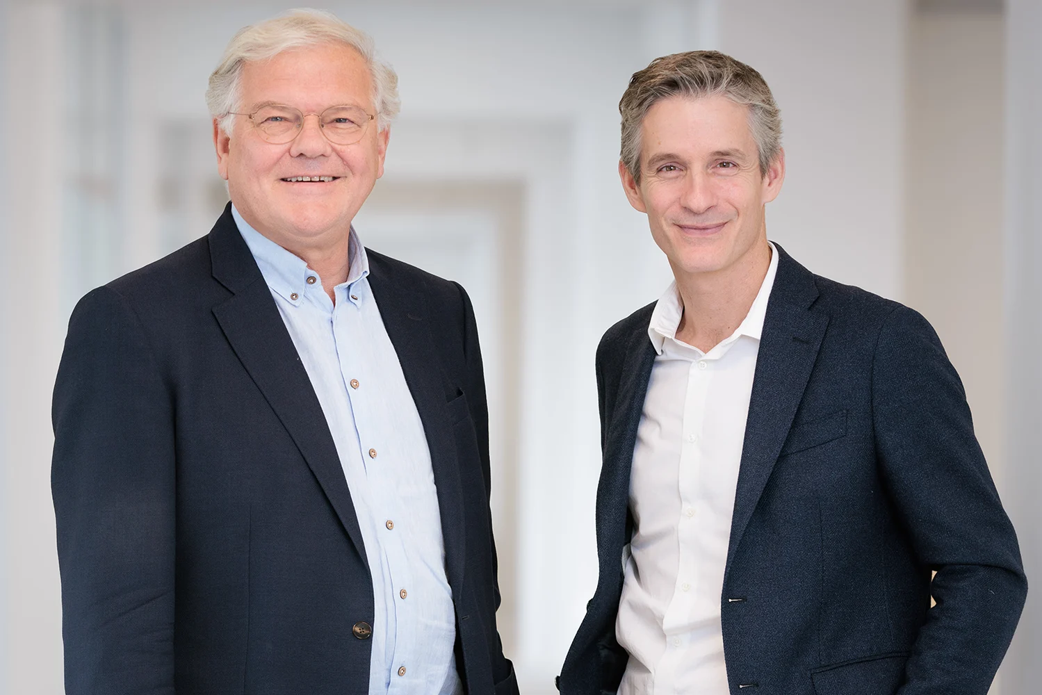 Chairman and ceo of Proximus stand side by side.